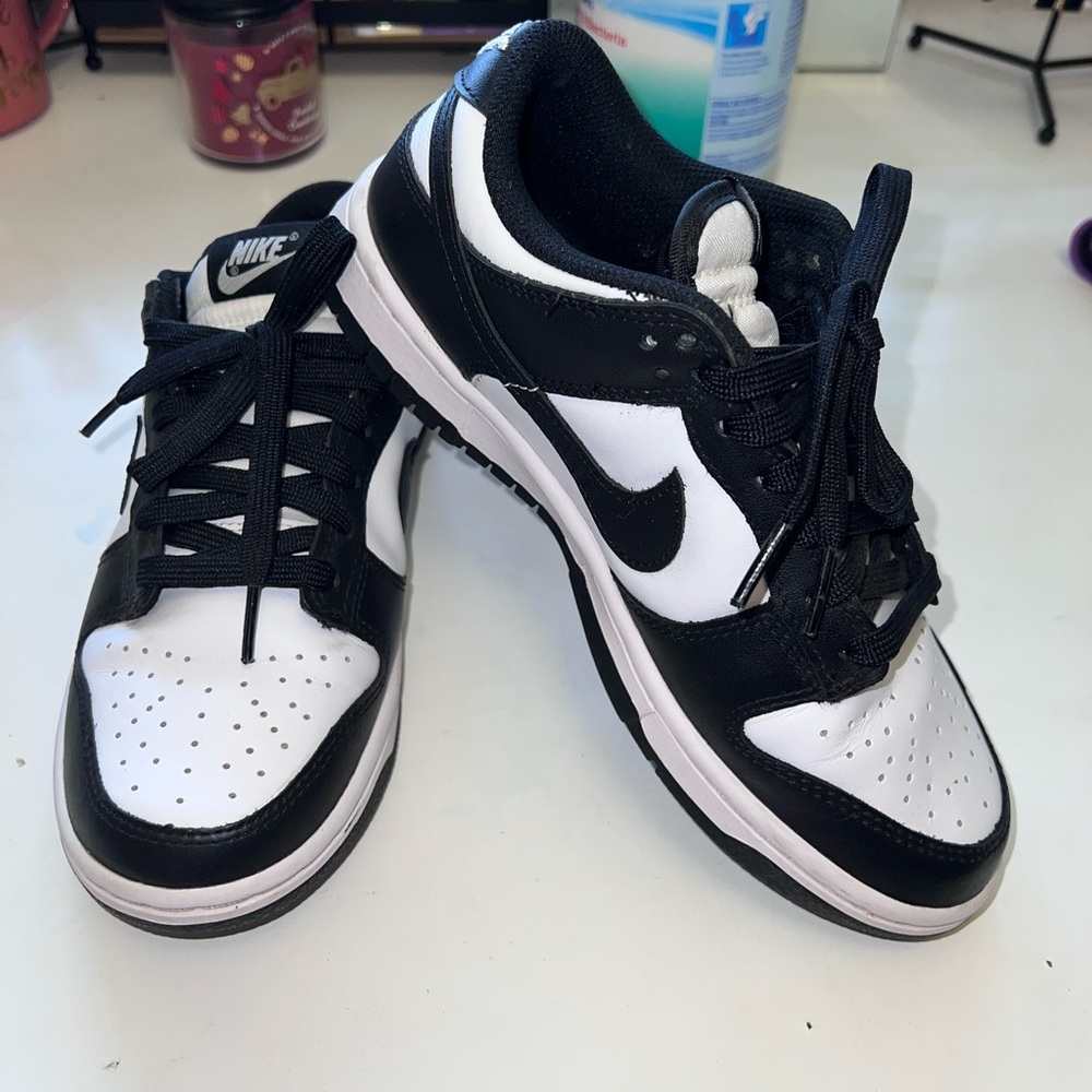 Women’s Nike Dunks low top in black in and white size 7